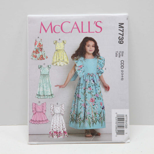 M7739 Girls Dresses