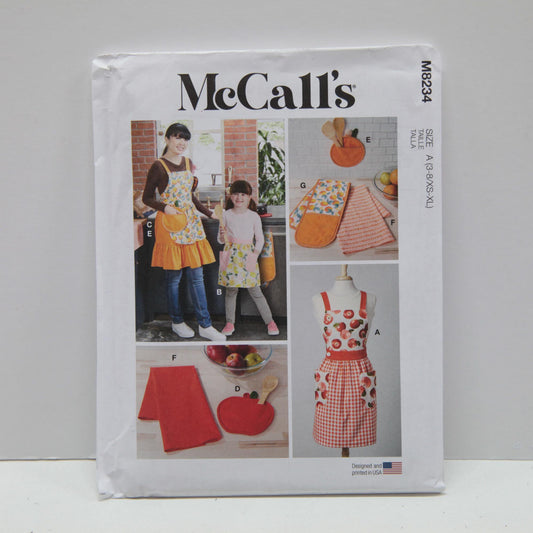 M8234 Misses Children's and Misses Aprons, Potholders and Tea Towel