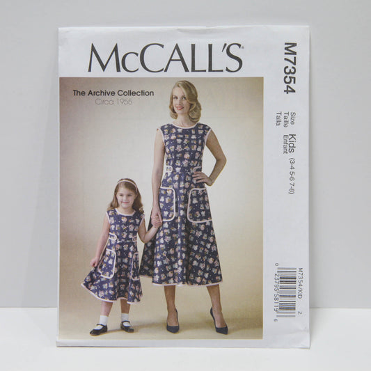 M7354 Misses and Childrens Dress